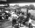 Crowd around locomotive and train at Six Flags Over Texas, Arlington, Texas