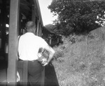 Man (photographed from back) on train at Six Flags Over Texas, Arlington, Texas