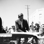 Senator John F Kennedy in motorcade during presidential campaign in Arlington, Texas