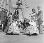 Visitors to Seven Seas, children riding in turtle cars, Arlington, Texas