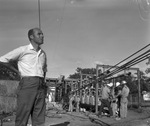 Workmen at installation of ride at Six Flags Over Texas