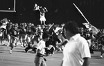 Lamar High School Vikings football team running through banner