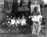 Grandma Davis with babies at Davis family reunion. by Basil Clemons 1887-1964