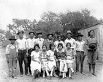 Group of Mexican men and women in Breckenridge, Texas. by Basil Clemons 1887-1964