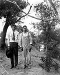 Two Mexican men in Breckenridge, Texas. by Basil Clemons 1887-1964