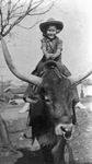 Portrait of a girl on a bull by Basil Clemons 1887-1964