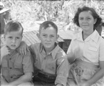 Portrait of two boys and one girl by Basil Clemons 1887-1964