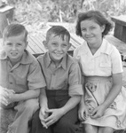 Portrait of two boys and one girl by Basil Clemons 1887-1964