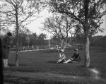 Women in a park by Basil Clemons 1887-1964