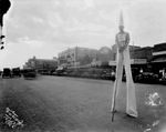 Man on stilts by Basil Clemons 1887-1964