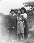 A family pose with a graduate by Basil Clemons 1887-1964