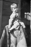 Portrait of a boy by Basil Clemons 1887-1964