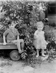 Portrait of a girl and a boy by Basil Clemons 1887-1964