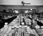 Unidentified notions store showing floor full of merchandise by Basil Clemons 1887-1964