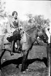 Portrait of a woman on a horse by Basil Clemons 1887-1964