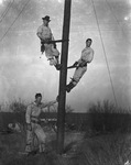 Men on telephone pole by Basil Clemons 1887-1964