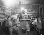 People in a small grocery store by Basil Clemons 1887-1964