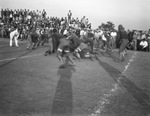 A football game by Basil Clemons 1887-1964