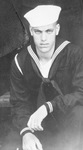 A man posing in a United States Navy uniform by Basil Clemons 1887-1964