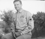 A man posing in a United States Army uniform by Basil Clemons 1887-1964