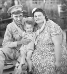 A United States Army officer with his wife and son by Basil Clemons 1887-1964