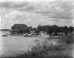 A large wooden building used by visitors to Lake de La Fosse by Basil Clemons 1887-1964