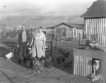 A couple, their chickens, and their dog by Basil Clemons 1887-1964