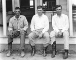 Three men sitting on a porch by Basil Clemons 1887-1964