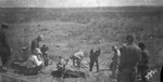 A group of snake hunters use a jackhammer to reach a den of rattlesnakes by Basil Clemons 1887-1964