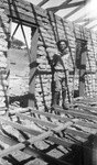 A man in construction area by Basil Clemons 1887-1964