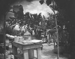 A courtyard filled with items by Basil Clemons 1887-1964