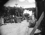 A courtyard filled with items by Basil Clemons 1887-1964