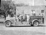 Men on a firetruck by Basil Clemons 1887-1964