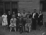 Members of a family, possibly at a reunion, pose for an outdoors photograph by Basil Clemons 1887-1964