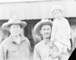 A couple poses with a young girl by Basil Clemons 1887-1964