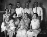 Members of a family pose for photograph by Basil Clemons 1887-1964