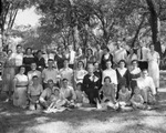 A large group of people, possibly a family reunion or birthday by Basil Clemons 1887-1964