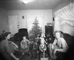 Christmas tree and presents by Basil Clemons 1887-1964