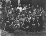 A large group of people in front of a building by Basil Clemons 1887-1964