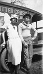 A couple leaning against a car by Basil Clemons 1887-1964