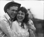 A smiling couple by Basil Clemons 1887-1964