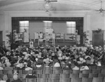 Women attending a home economics demonstration by Basil Clemons 1887-1964