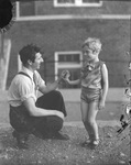 A man and a young child, Davis Dancers performers by Basil Clemons 1887-1964