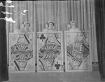 Three young costumed female Davis Dancers performers standing behind giant playing cards by Basil Clemons 1887-1964