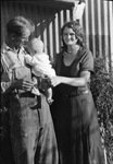 A family, man, woman and baby by Basil Clemons 1887-1964