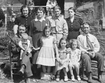 A family formal photograph. by Basil Clemons 1887-1964