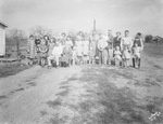 Members of a family pose for an outdoors photograph by Basil Clemons 1887-1964