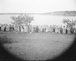 A baptism being held in a river near Breckenridge, Texas by Basil Clemons 1887-1964