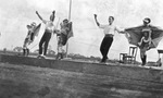 Circus performers in a tight rope walking act by Basil Clemons 1887-1964