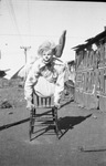 A clown in a contortionist pose by Basil Clemons 1887-1964